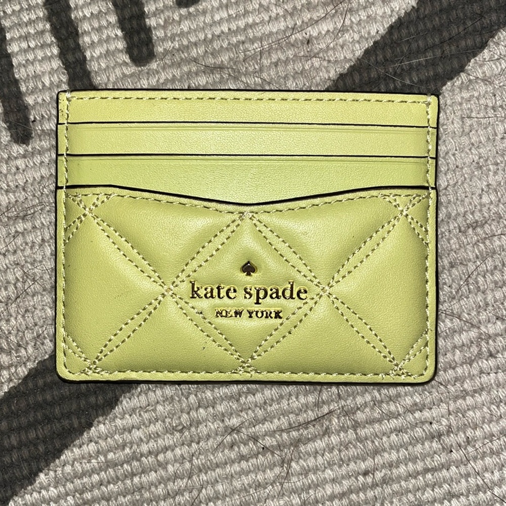 Yellow quilted Kate Spade card holder